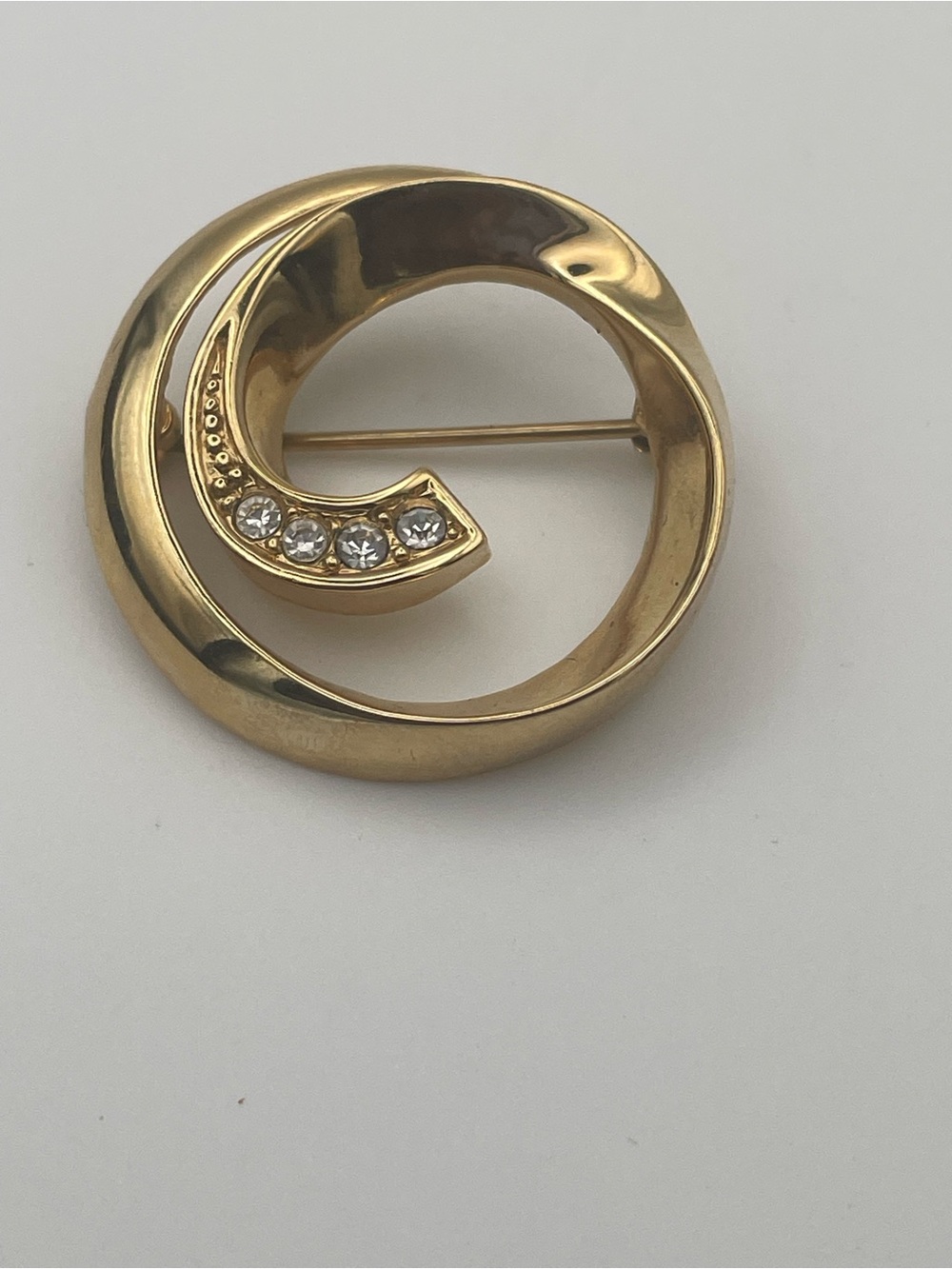 Avon Gold-Tone Spiral Circular Brooch with Clear Crystal Accents